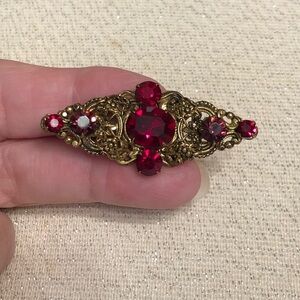Vintage-Style Gold Tone Brooch with Deep Red Rhinestones